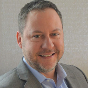 Head shot photo of Chris A. Otto, SVP, Clear Arch Health